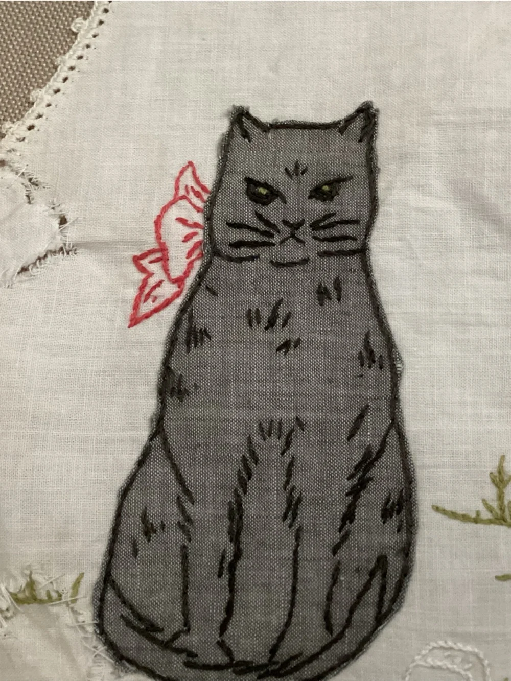 Antique hand-made embroidered linen baby bib featuring a lg. grey cat